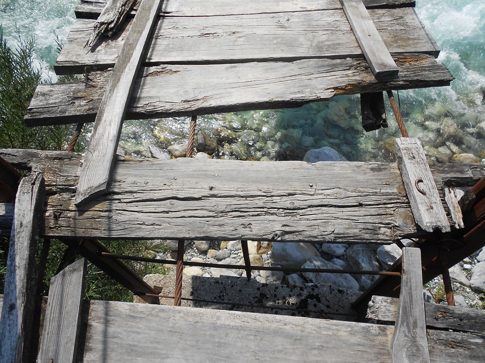 This broken bridge represents the crumbling infrastructure that holds up sexual and domestic violence organizations across North America