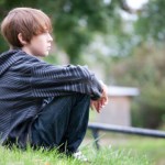 Boy-Sitting-Alone via treatmenttalk.org