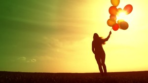 cheerful-happy-woman-enjoying-nature-beautiful-sky-balloons
