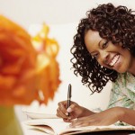 woman-writing-in-journal via blissyfit.com